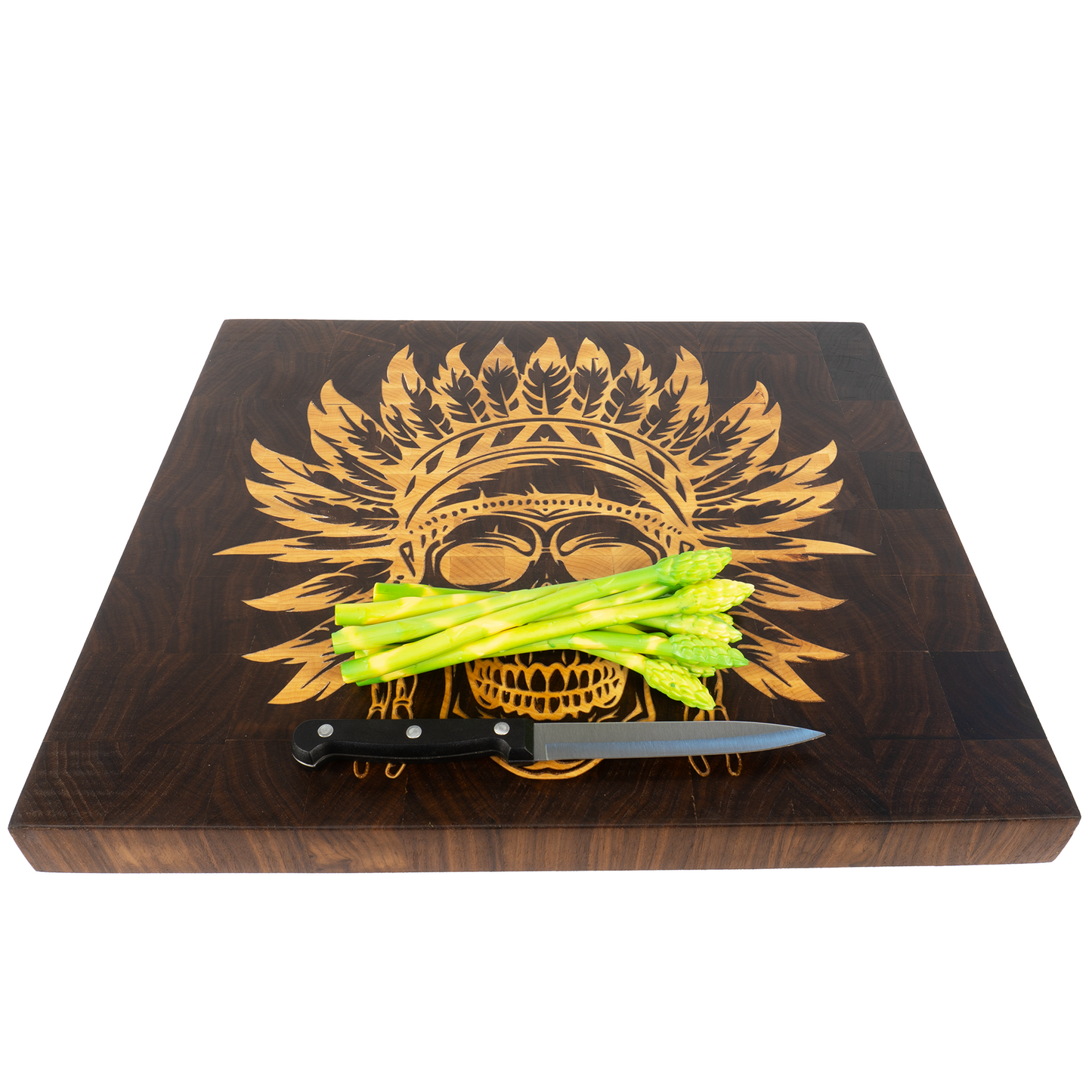 Handcrafted walnut end grain maple skull board with asparagus and knife angled — Red Tail Boards