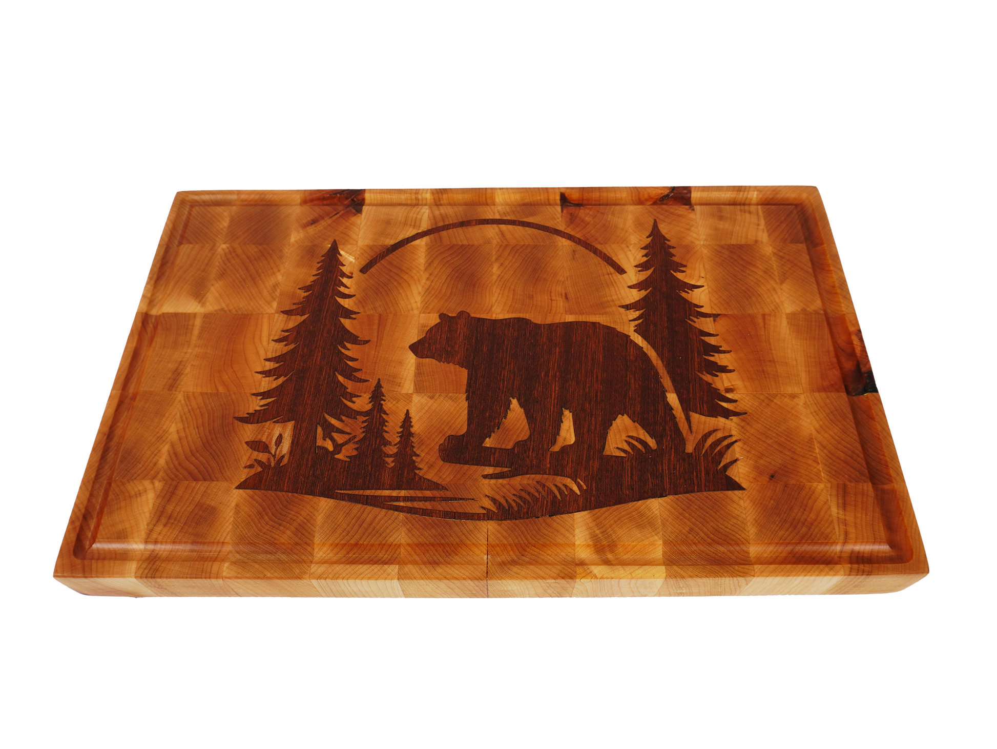 45-degree hero shot showing the contrast between the maple surface and dark walnut bear inlay.