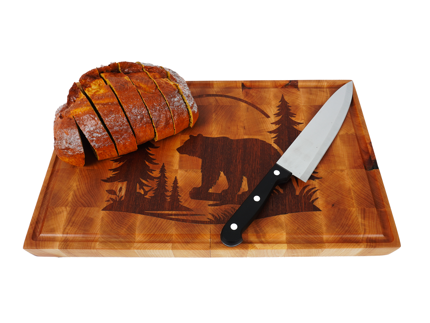 Angled shot of bread service on the Kodiak, highlighting the walnut bear inlay in the corner.