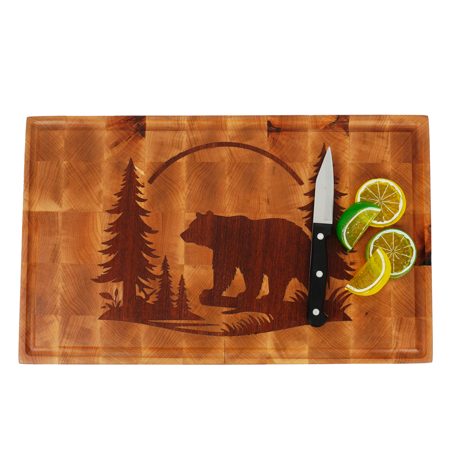 Top-down view of sliced citrus on the bright maple surface of the Kodiak Sovereign board.