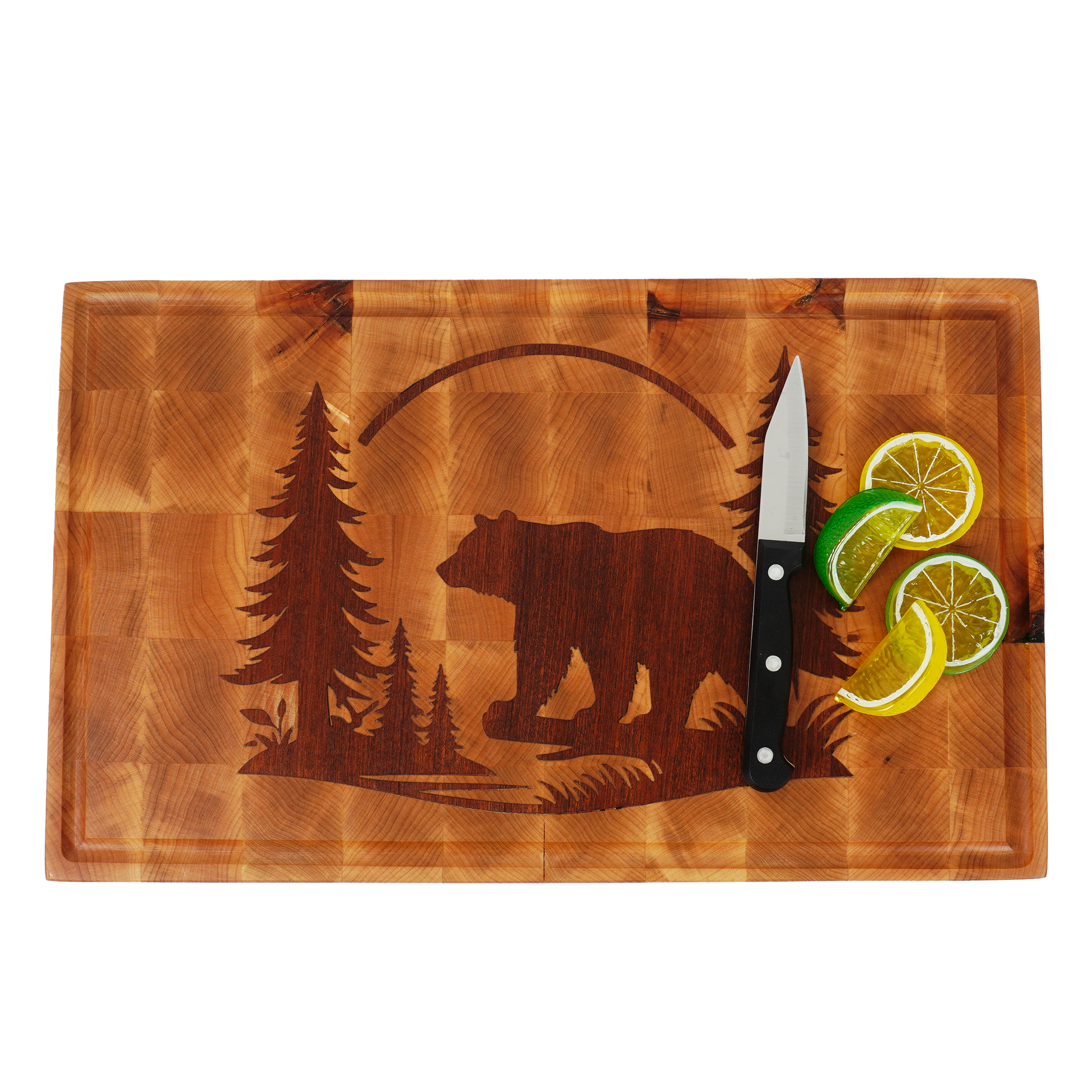 Top-down view of sliced citrus on the bright maple surface of the Kodiak Sovereign board.