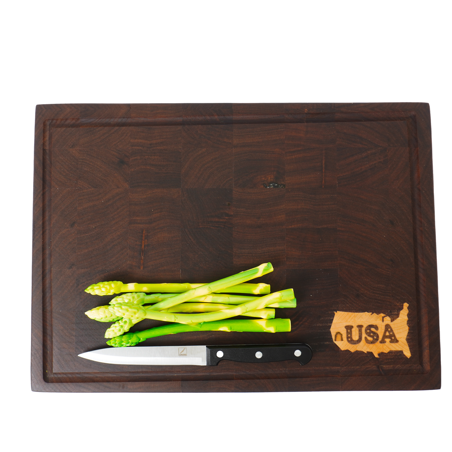 Overhead scale shot of the Patriot Sovereign board featuring fresh asparagus to show surface area.