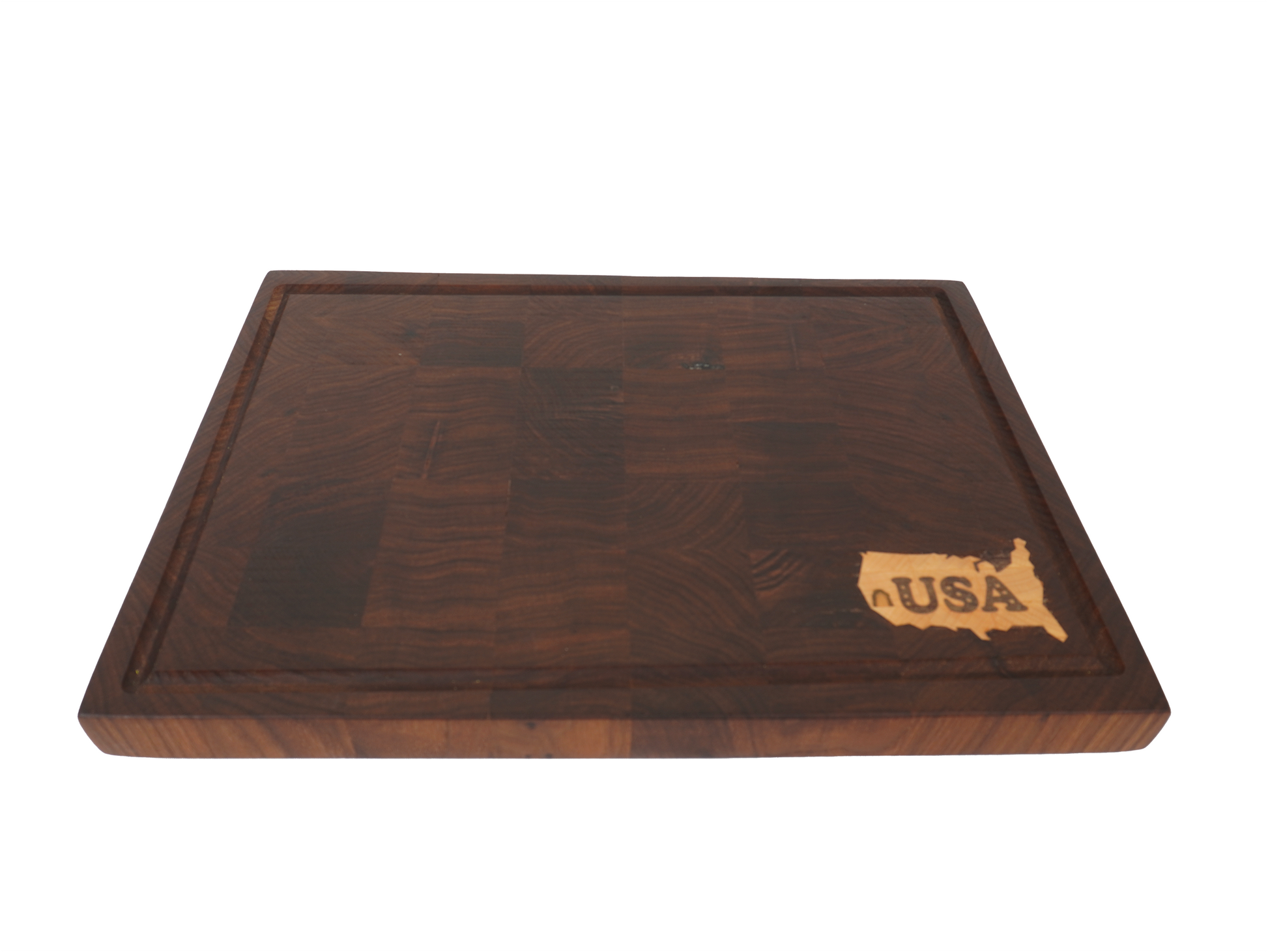 Angled front view of the Patriot Sovereign professional butcher block showcasing thickness and US inlay.