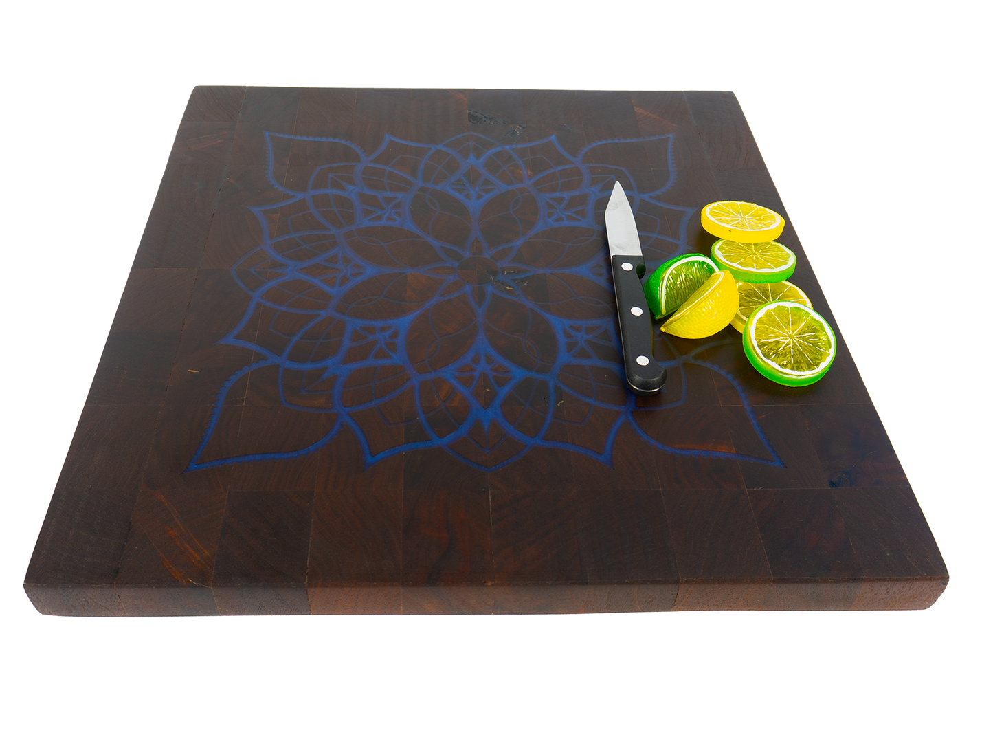 22x22 walnut end grain blue mandala inlay board with citrus and knife angled — Red Tail Boards