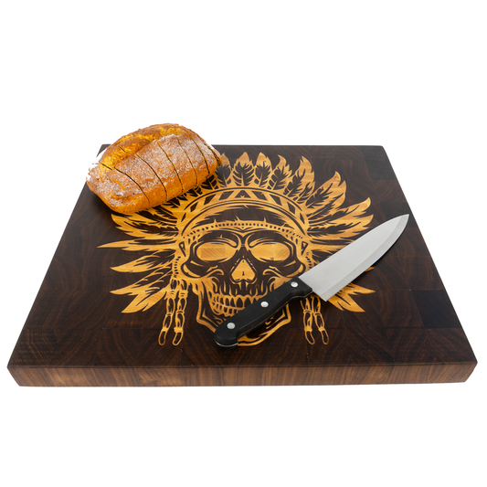 22x16 walnut end grain maple skull inlay board with sliced bread and knife angled — Red Tail Boards