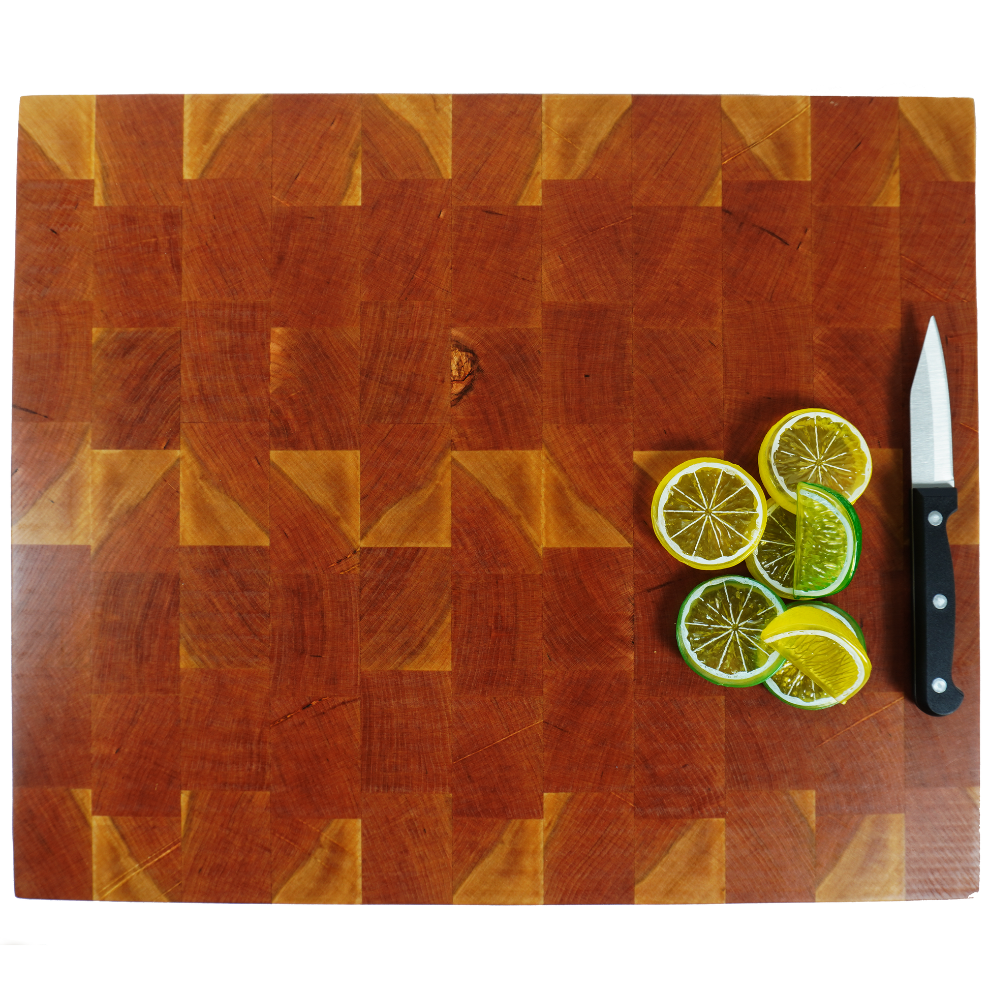 Cherry end grain cutting board with lemon, limes, and knife, top down view