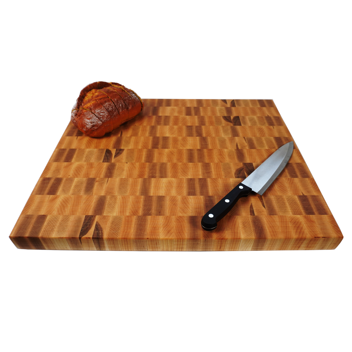 Maple end grain cutting board with sliced loaf of bread and knife at 45 degree angle