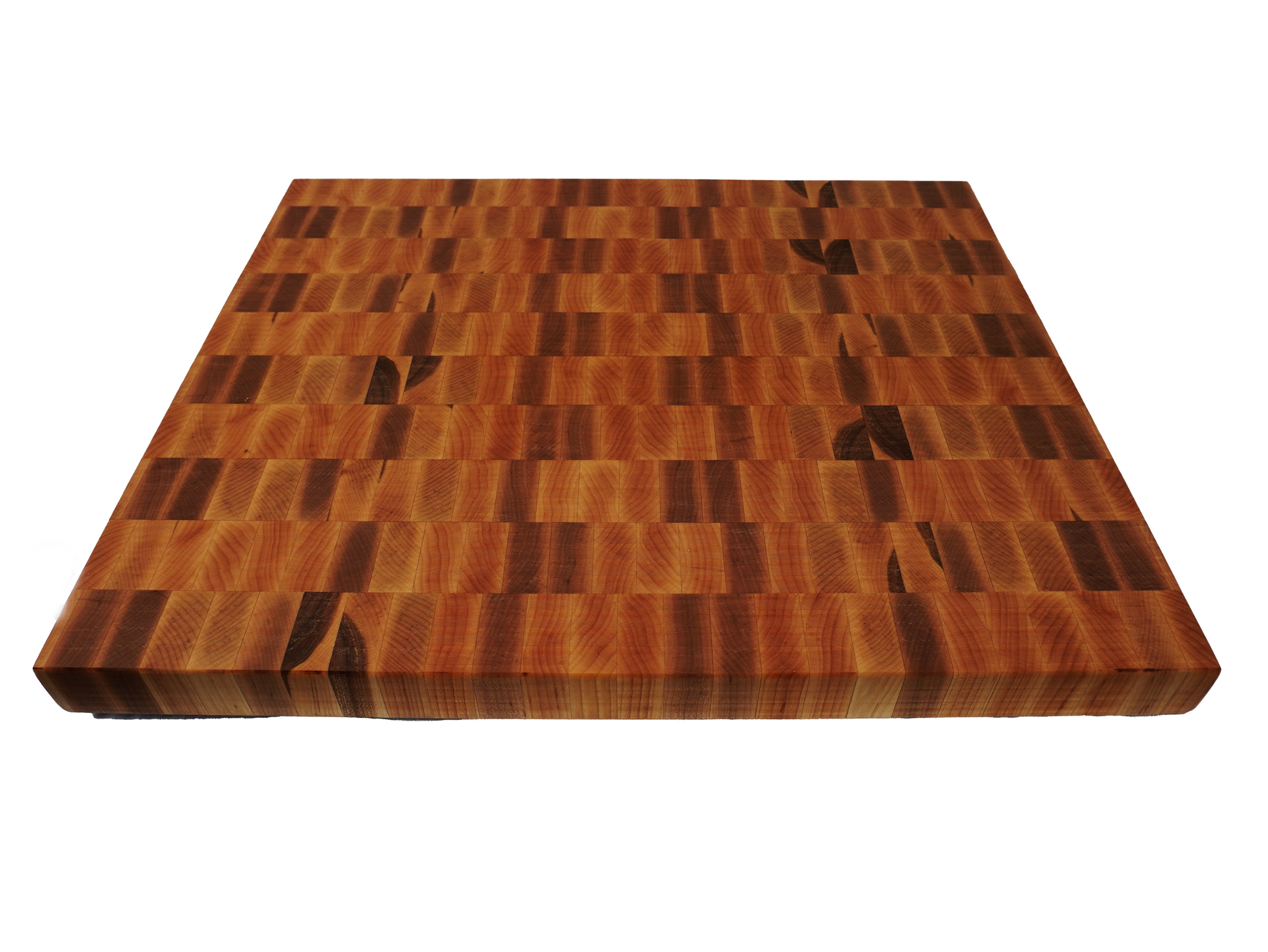 Thick maple end grain cutting board at 45 degree angle showing board height and wood grain