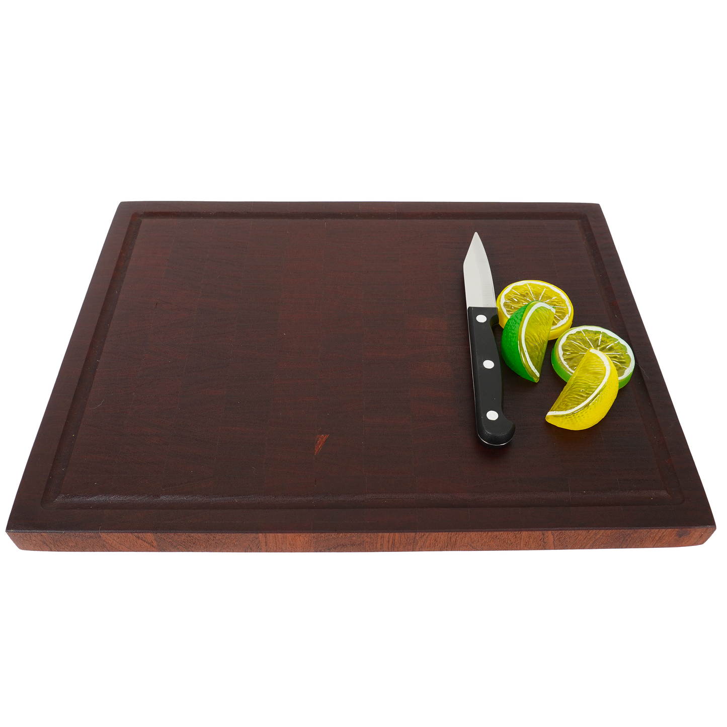 Angled view of the Sapele end grain board being used for citrus preparation.