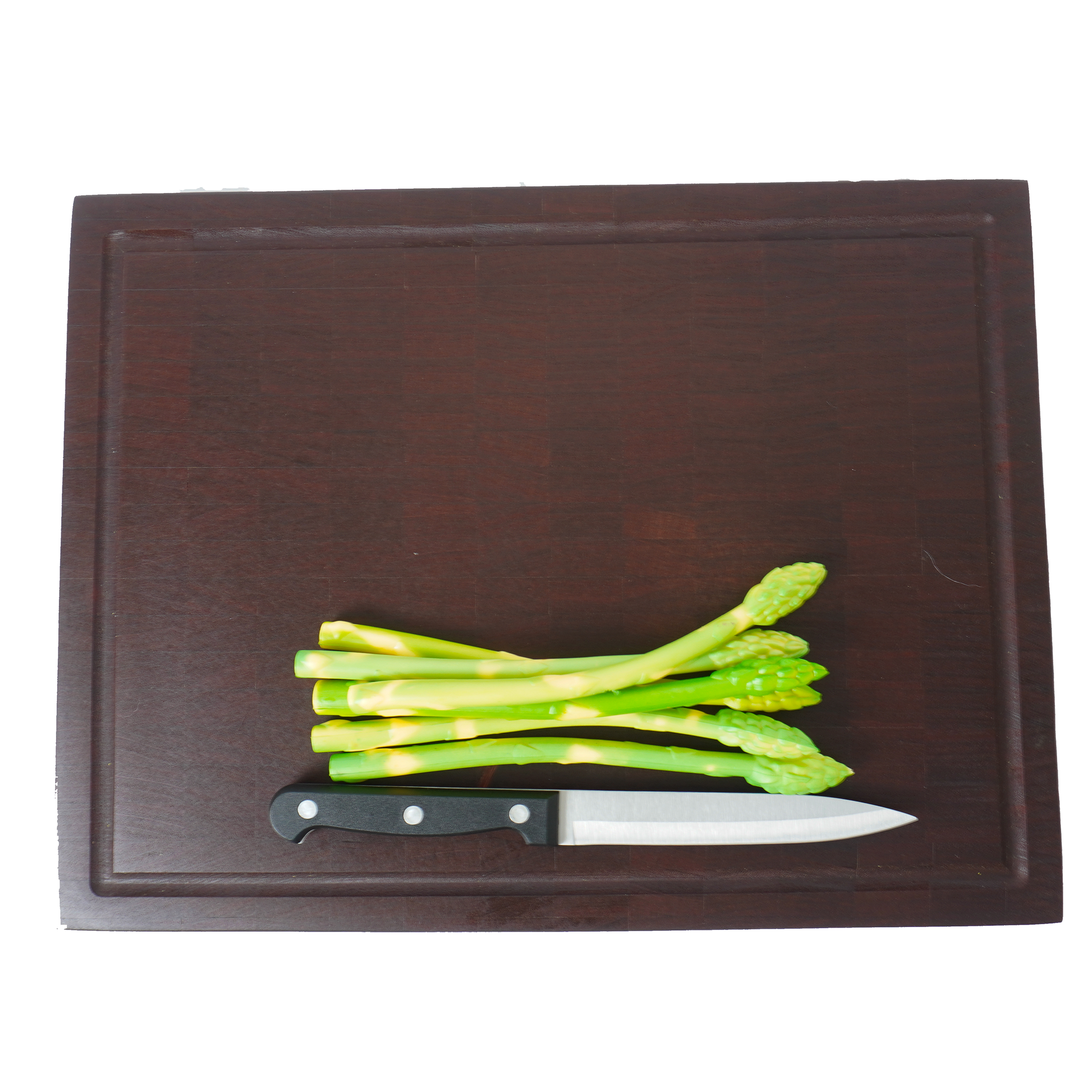 Overhead scale shot of the Sapele board featuring fresh asparagus to show surface area.