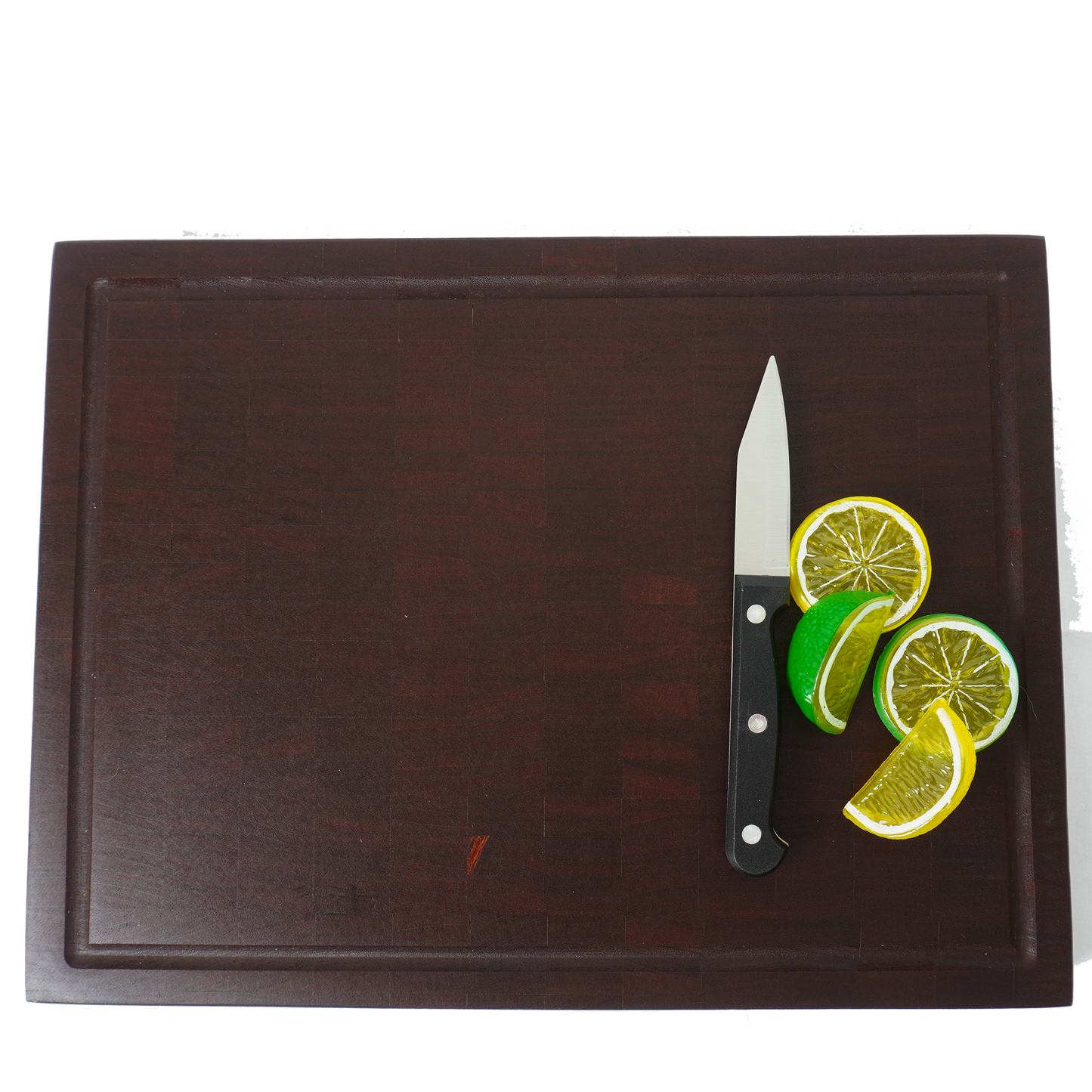 Overhead view of the Sapele board staged with sliced citrus for scale and contrast.