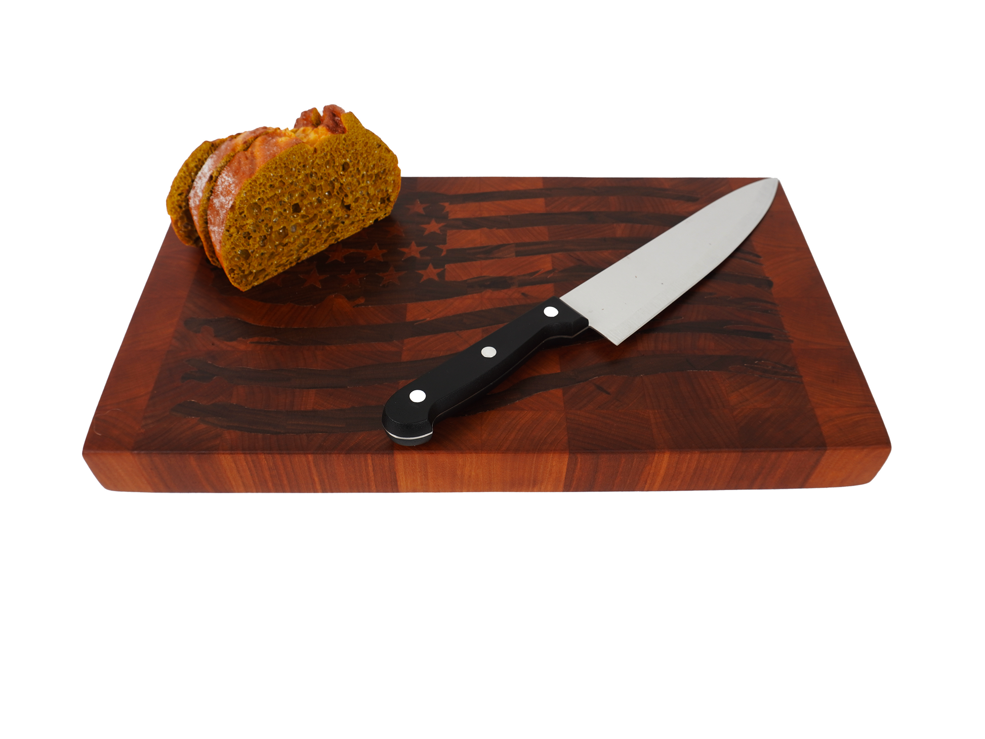 Tattered Glory Sovereign end grain cutting board angled view with sliced loaf and bread knife, Black Walnut tattered flag inlay Hard Rock Maple