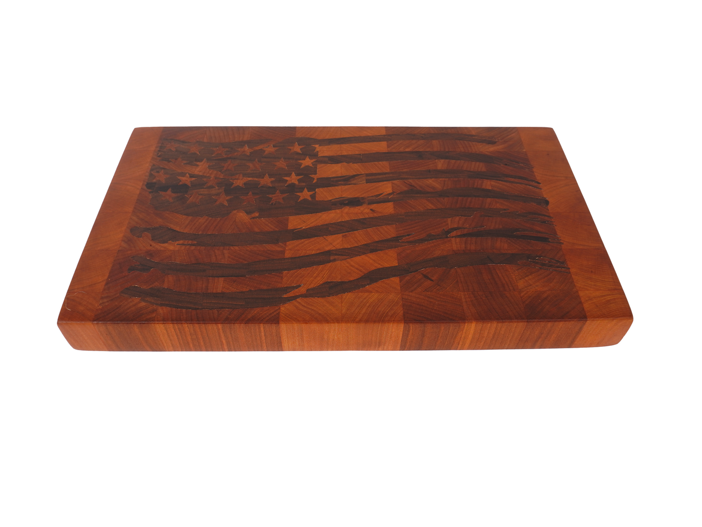 Tattered Glory Sovereign end grain cutting board angled view showing Black Walnut American flag inlay depth and 1.5 inch thickness on Hard Rock Maple